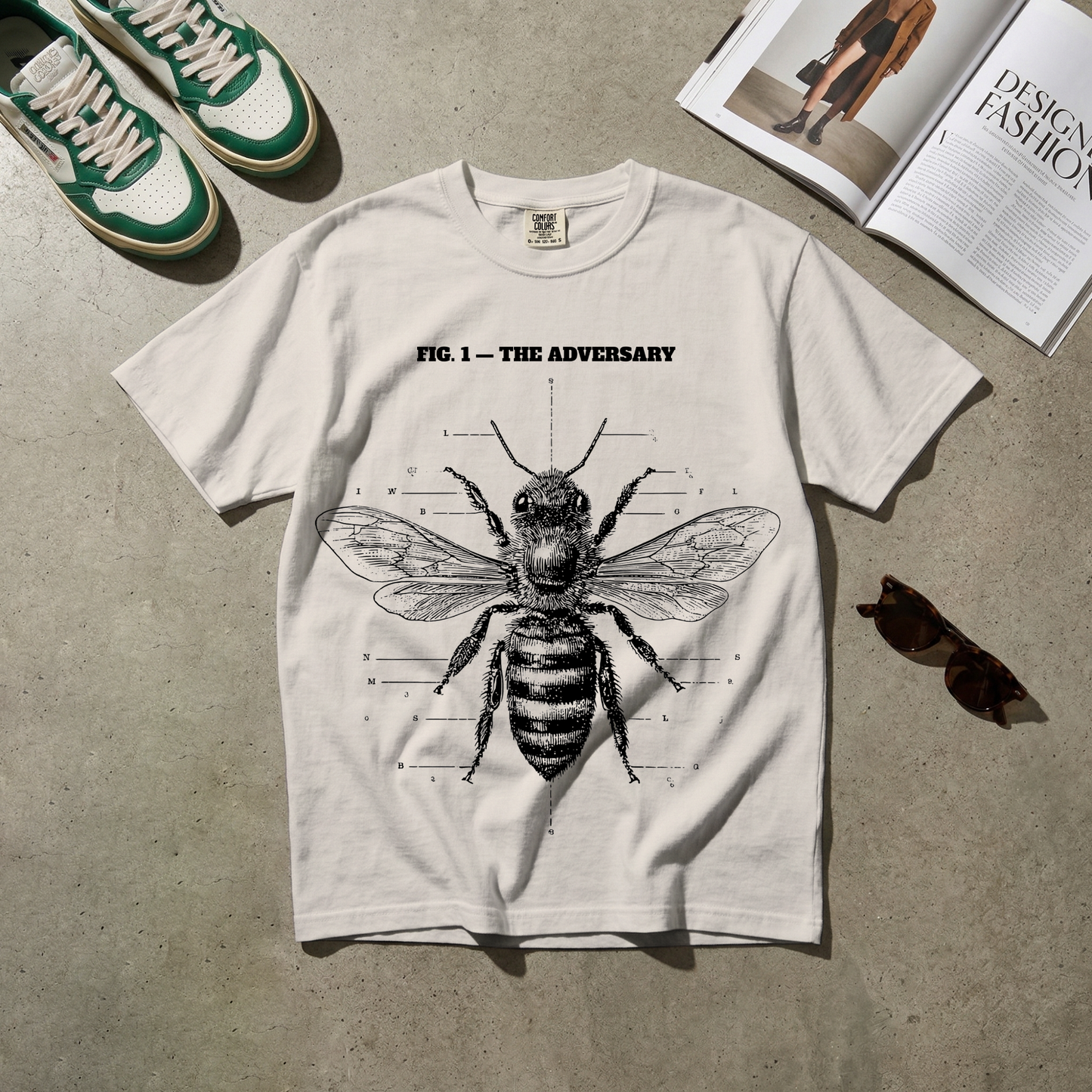 Fig. 1 — The Adversary. Beekeeper Tee