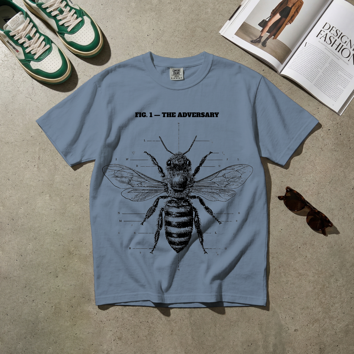 Fig. 1 — The Adversary. Beekeeper Tee
