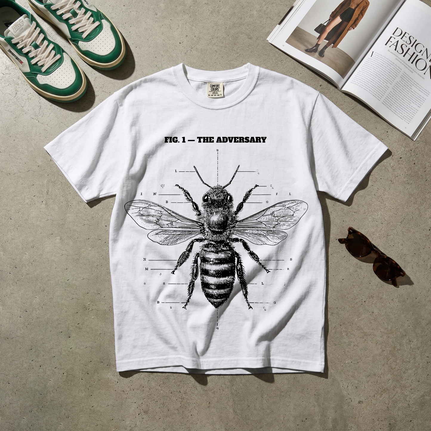 Fig. 1 — The Adversary. Beekeeper Tee